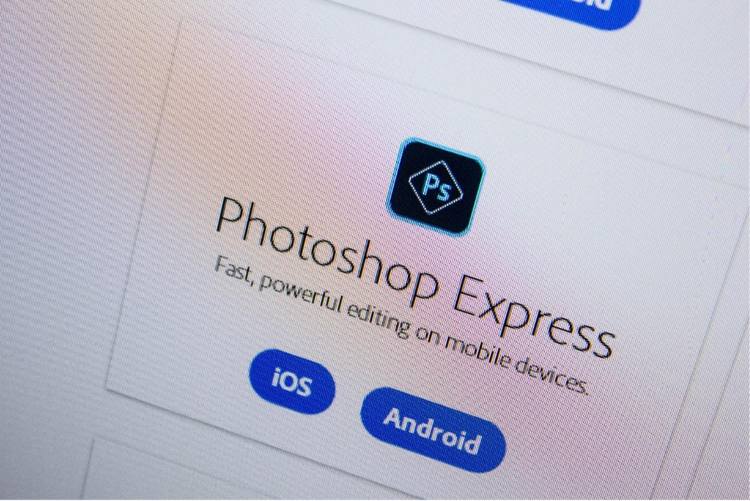 Photoshop Express software logo on the official website of Adobe with buttons for download for iOS and Android.