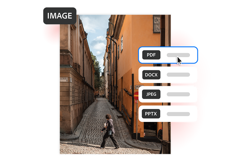 Una strada acciottolata con edifici dai toni caldi color arancio, mostrata come conversione da immagine a PDF con il formato PDF selezionato nel menu dei formati