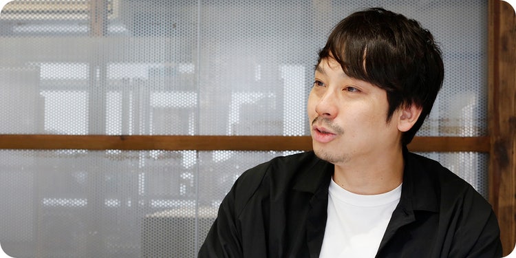 中川大地さんのポートレート写真。