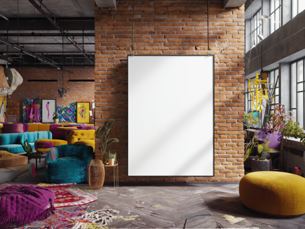 A blank poster on a wall in an eclectic and colorful loft