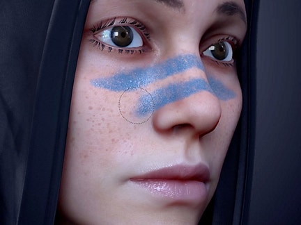 Blue stripes 3D painted on a model of a woman's face