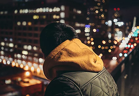 A photo of a person with a bokeh effect added.