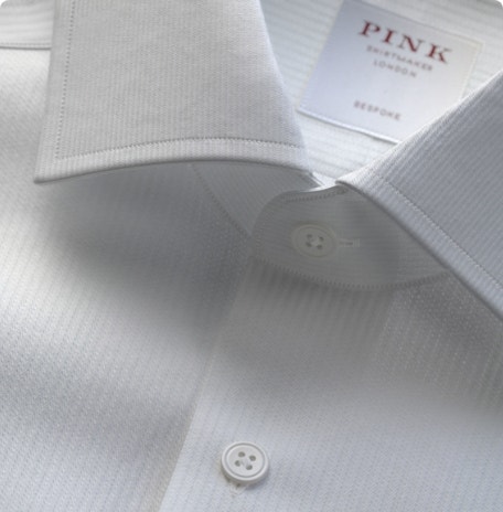 3D visualization rendering of a white button-down shirt generated in Adobe Substance 3D. | https://main--cc--adobecom.aem.live/products/substance3d/magazine/3d-visualization-for-fashion