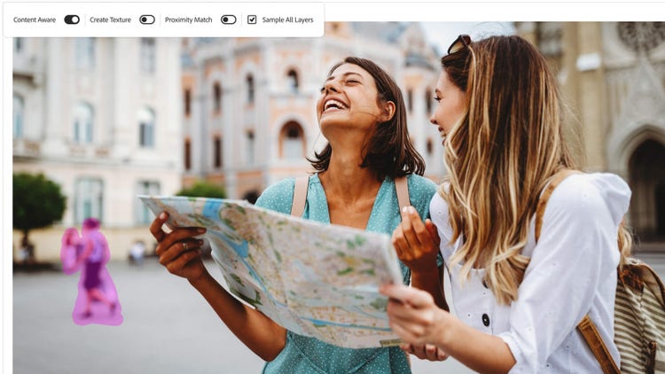 Two women looking at a map with a couple highlighted in pink for removal in the background., Picture, Picture