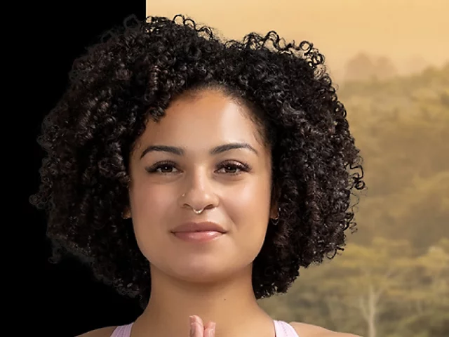 Using the Photoshop Refine Edge Brush tool to blend woman’s curly hair to new black background