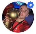 A person holding a trophy AI-generated content may be incorrect.