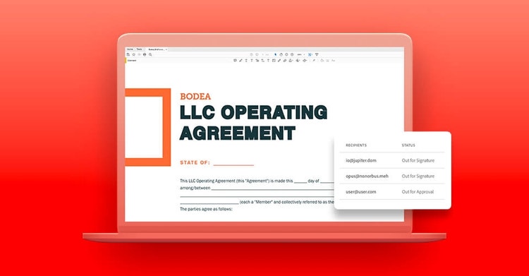 An LLC operating agreement PDF viewed on a laptop