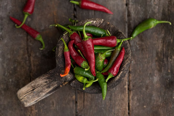 Photo of red and green chilies