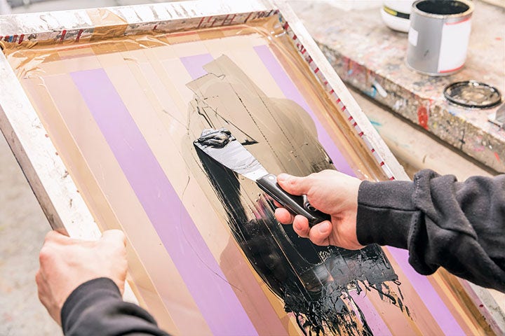 The process of screen printing
