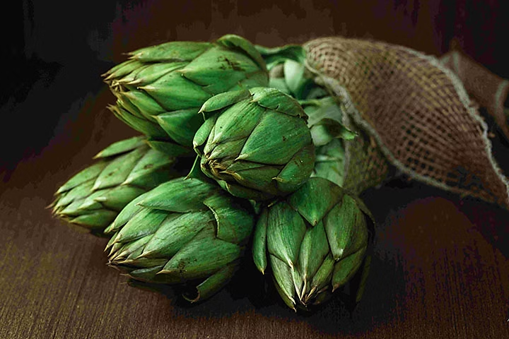 An image of some artichokes, with slightly pixelated background