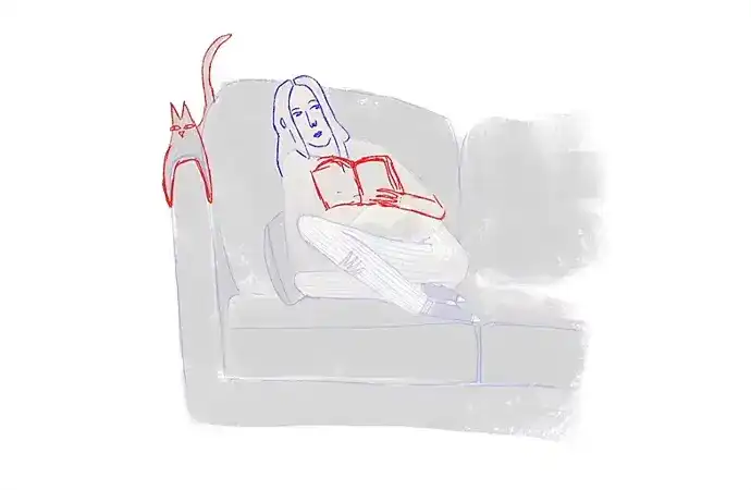 Rough sketch and inked storyboard panel side by side, showing a figure reading on a sofa with a cat perched nearby