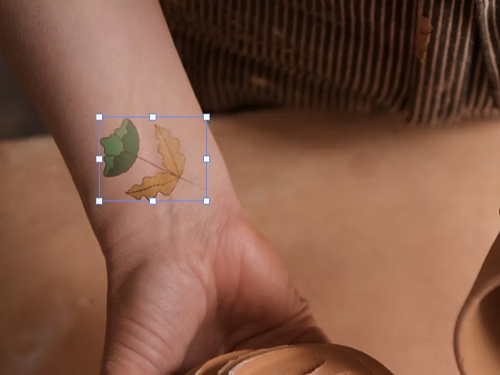 A mock tattoo placed on someone's arm using Photoshop.