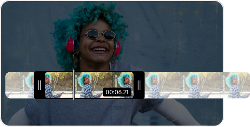 A video featuring a person with green hair and headphones. The video is being trimmed.